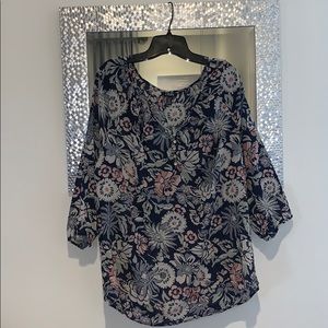 Floral Blouse with blue, mauve and beige tones.